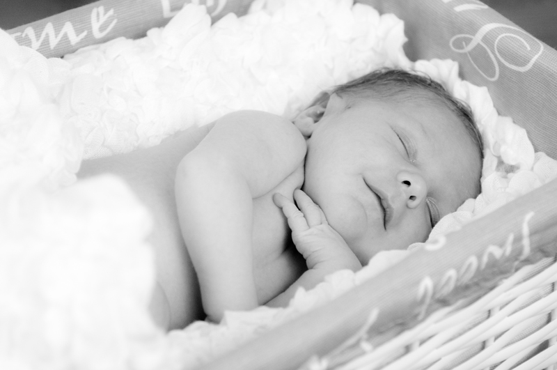 Newborn fotografie lachende baby